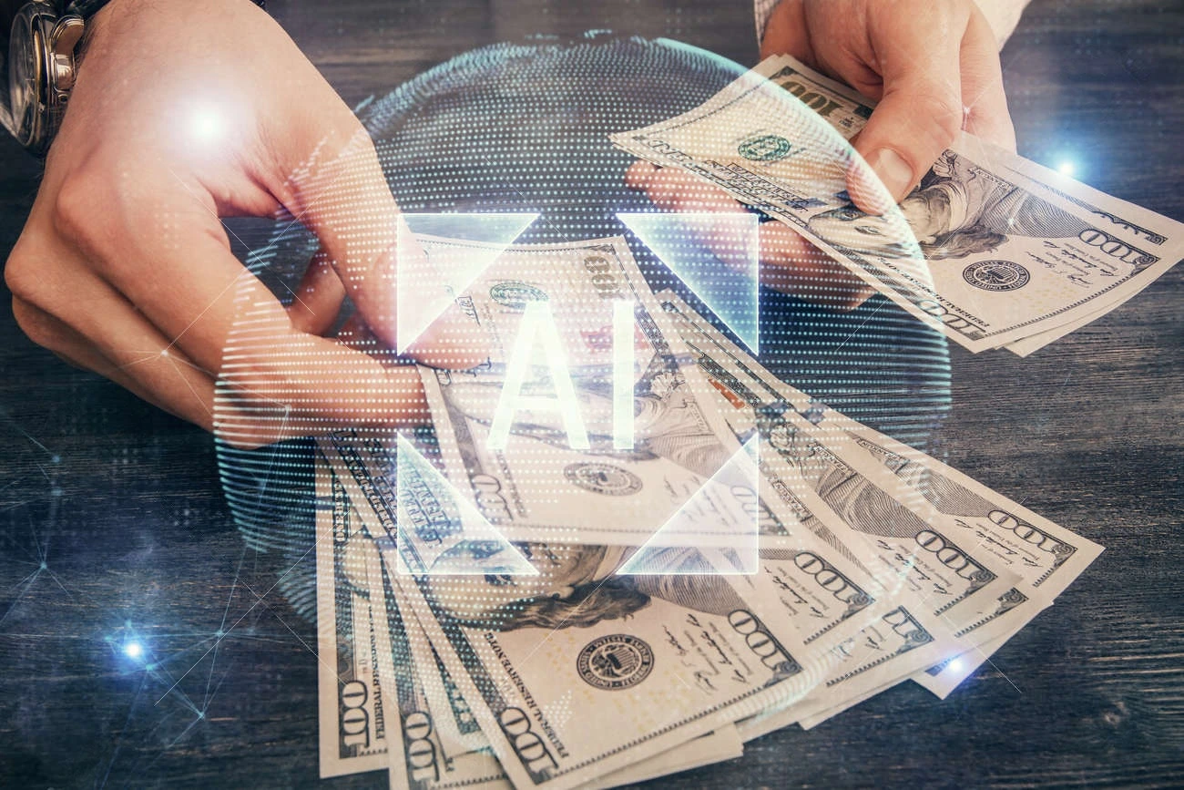 A person counts US hundred-dollar bills on a table, with a digital overlay displaying "AI" and abstract tech graphics&mdash;perfect for showcasing the power of an AI caption generator in financial settings.