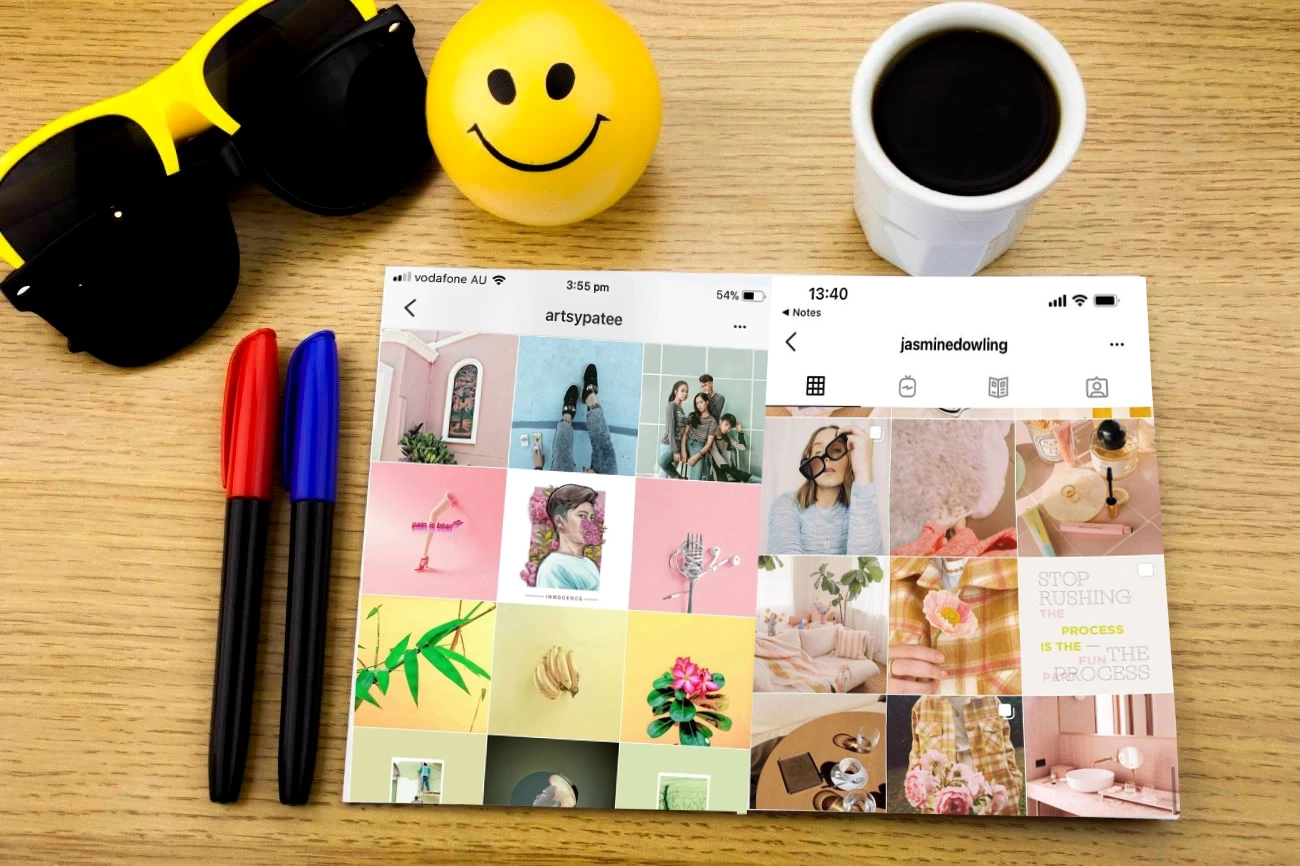 Sunglasses, three markers, a smiley face ball, a cup of coffee, and a tablet displaying two Instagram profiles on a wooden table&mdash;perfect inspiration for crafting creative IG captions.