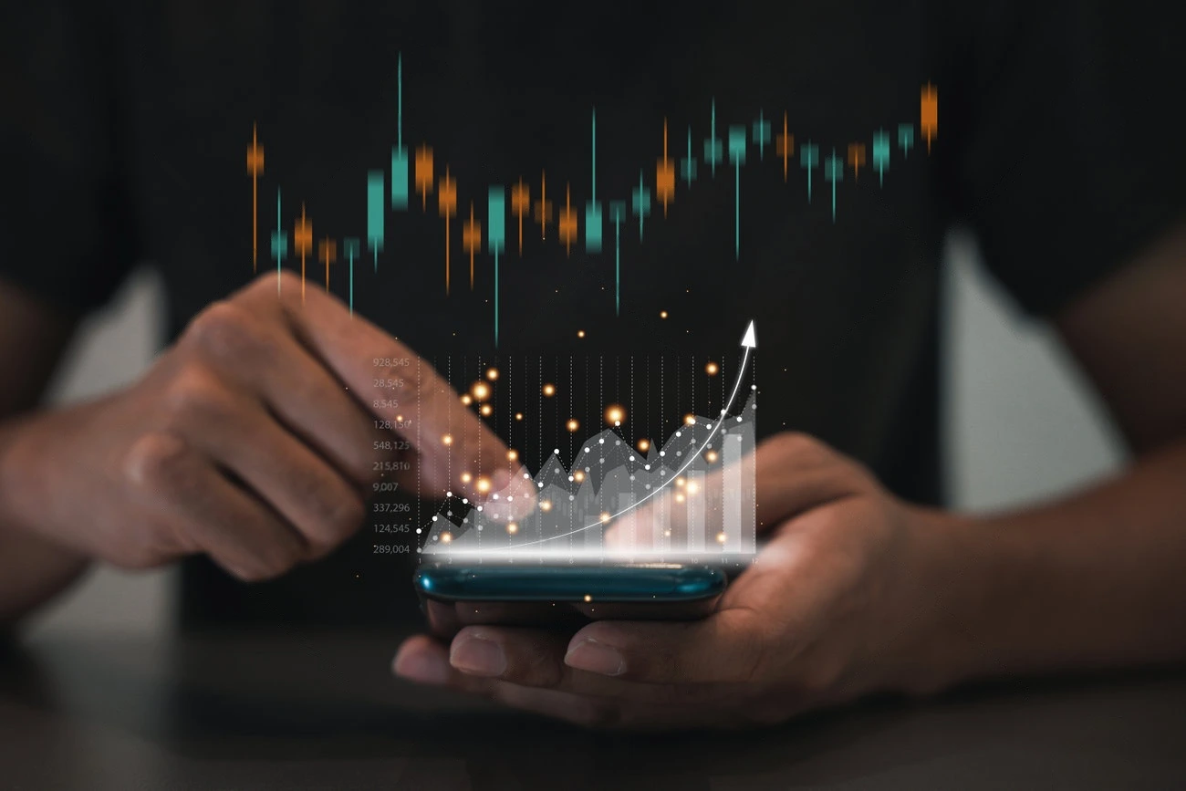 A person uses a smartphone with a digital graph and upward arrow, symbolizing financial growth, data analysis, and rising Instagram Story Views superimposed above the device.